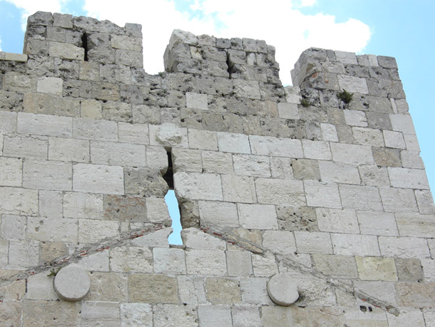 The stones atop Jaffa Gate on the western side of the city walls shows bullet and shell scarring from the 1948 War of Independence.  Jordanian troops held the Old City and the Israelis were desperate to relieve the Jewish Quarter inside.
