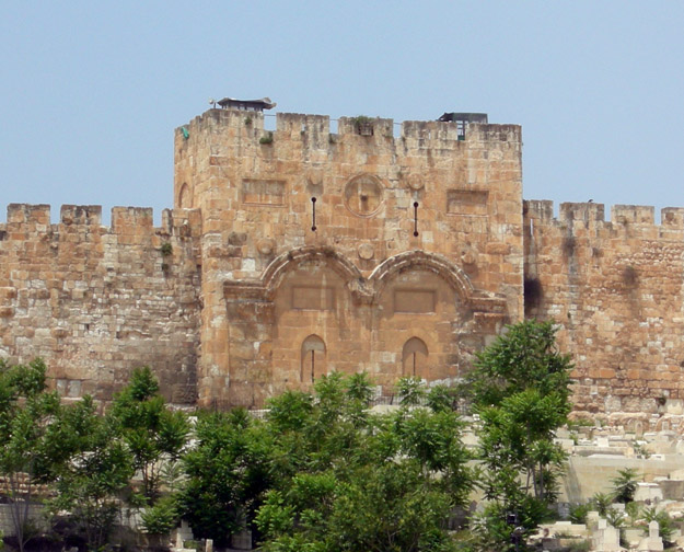 Golden Gate (Bab el-Rahma) in the eastern city wall.  Jewish tradition is that the Messiah will pass through this gate into Jerusalem.  Possibly for that reason the Muslim rulers in the 7th Century closed it up and placed a graveyard in fron of it.
