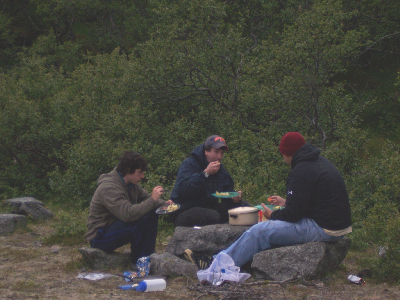 Adam, Rob, and Todd eating their awesome salmon dinner on the first night.
