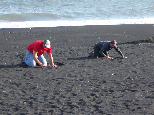 Todd and Rob on the black sand beach.