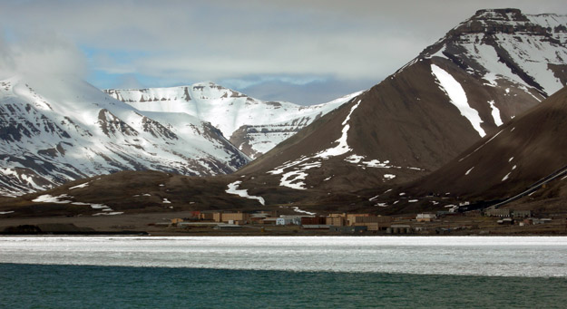 This is the abandoned Russian coal-mining town of Pyramiden.  We were unable to land there because of the thick pack ice between us and the harbor.  The town was evacuated quickly in 1998 as it became evident it could not survive economically without the subsidies it had received from the Soviet Union.  I wanted to see its "northernmost statue of Lenin".