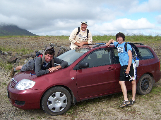 The Woo Crew with our trusty rental car.