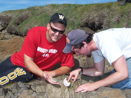 Todd and Rob in the fossil-crouching position on the Skagi shore.