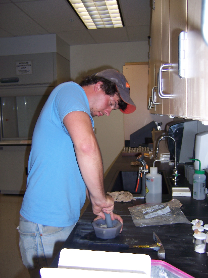 Rob powdering his zeolites by hand.