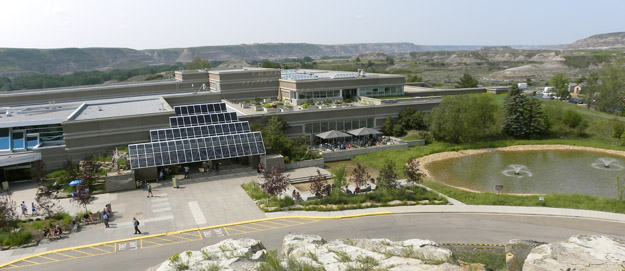 The Royal Tyrrell Museum of Palaeontology sits within a basin with badlands exposures of dinosaur-loaded Late Cretaceous terrestrial sediments.