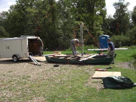 The first step was to build the raft. Dr. Lowell (aka "the core boss") is in the trailer. Bill and Rob assemble the parts and pieces.