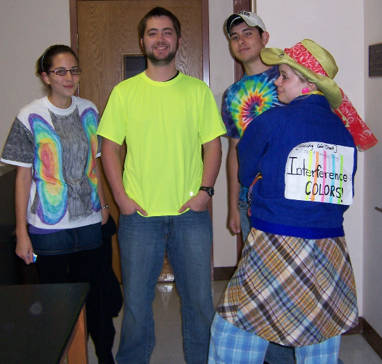 Becky Alcorn, Colin Mennett, Nick Fedorchuck, and Megan Innis are dressed as interference colors!