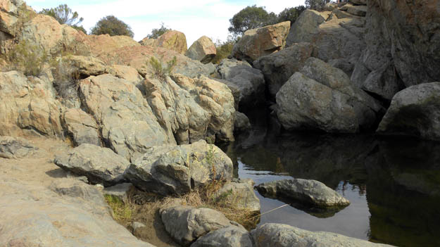 Waterfall (mostly dry) over Jurassic rocks in the Los Peñasquitos Canyon Preserve in San Diego County (N32.92712°, W117.17757°).