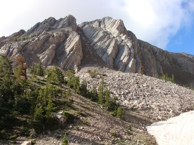 View of the Paleozoic carbonates that are wonderfully exposed along the climb toward Sacagawea Saddle.  This area is in the Gallatin National Forest.  Notice the huge talus pile and the remnant snow in the photo.