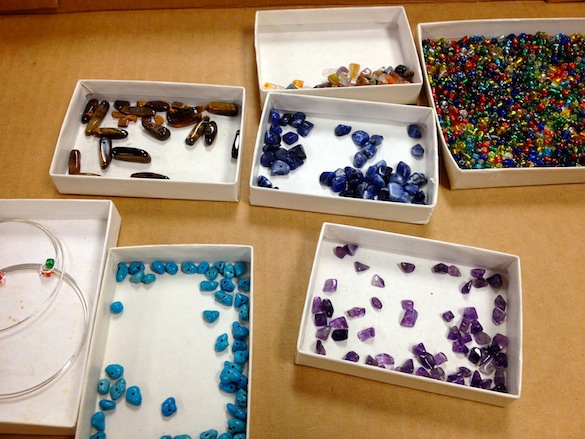 These colorful beads are made of minerals.