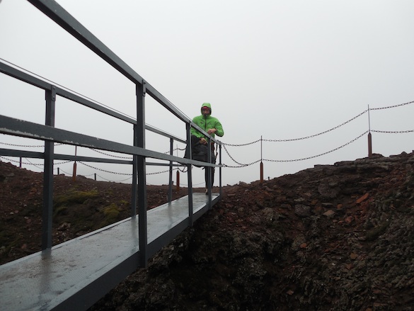 We crossed this bridge to get into the open-air basket that took us into the volcanic chamber. Photo Credit: Ellie Was