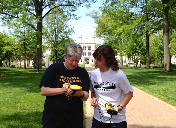 Tricia Hall ('14) and Dr. Shelley Judge work together to map a sidewalk.