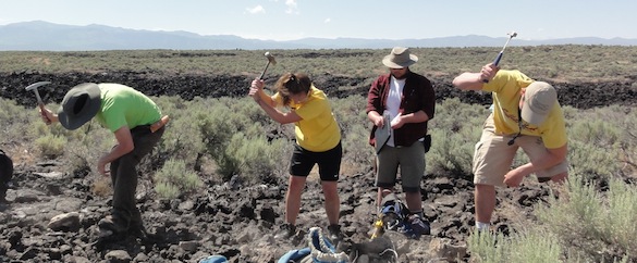 Synchronized hammering was the only way we could get samples of the tough lava. From left to right: Cam Matesich, Ellen Redner ('14, Albion), Kyle Burden ('14, Wooster), and Ben Hinks. Credit: M. Pollock