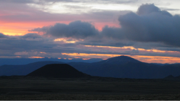 Photo credit: Julia F; A sunset view from basecamp. Pictured on the horizon is Eve Cone, one of the youngest cinder-cone volcanoes in the provincial park.