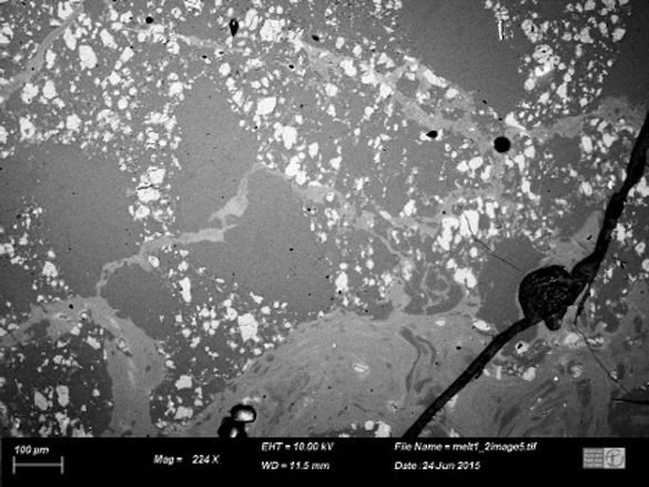 SEM (Scanning Electron Microscope) image of our unknown lunar sample. Shown above is a terrestrial alteration crack, several melt veins (from shock impact), and plagioclase grains outlined by a matrix of olivine and pyroxene grains.