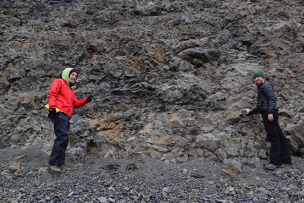 Michelle Orden and Anna Thompson with a shelved lava tube in the Undirhlíðar quarry. The tube was likely refilled with the darker lava.