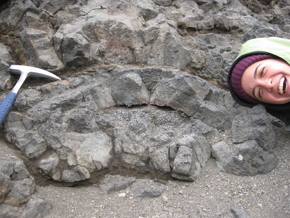 Cross section of a pillow lava, with Michelle Orden's ('17, Dickinson) head for scale.